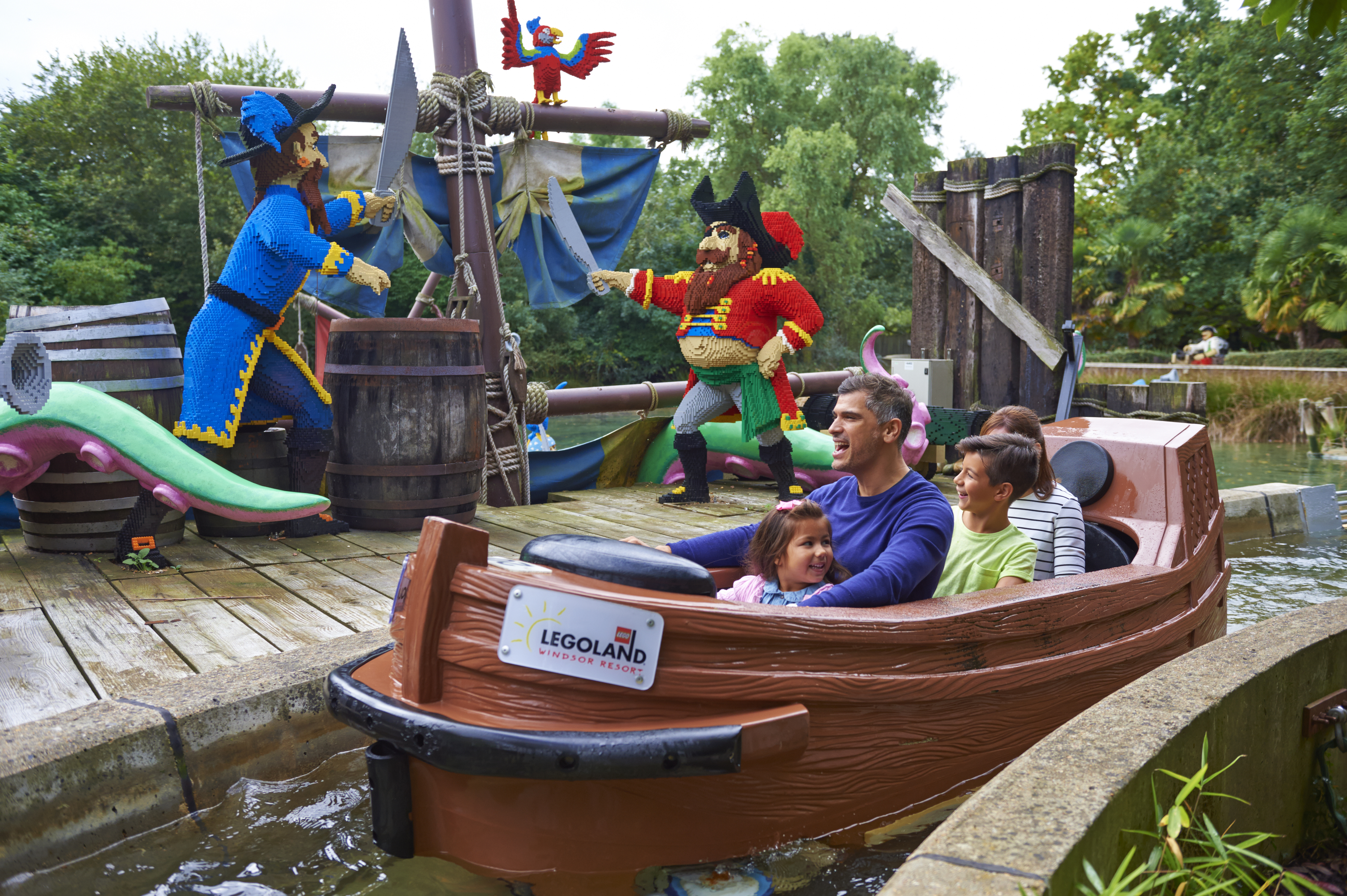 Legoland Windsor Pirate Falls Ride with dad and son in boat